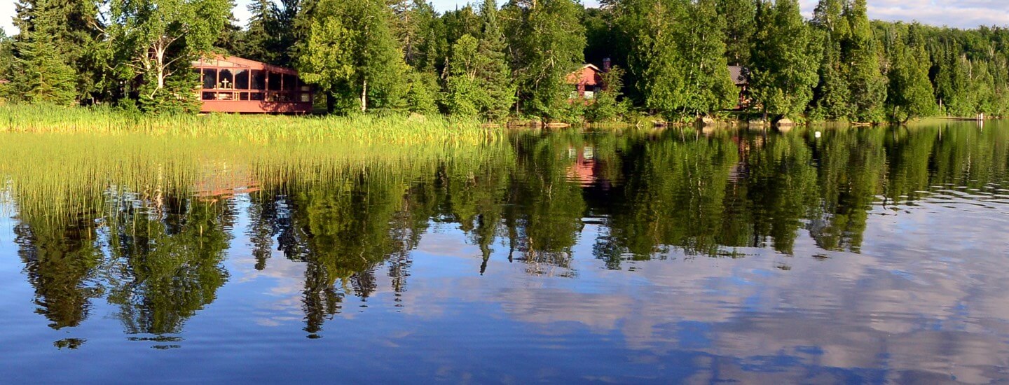 serenity scene of church on lake